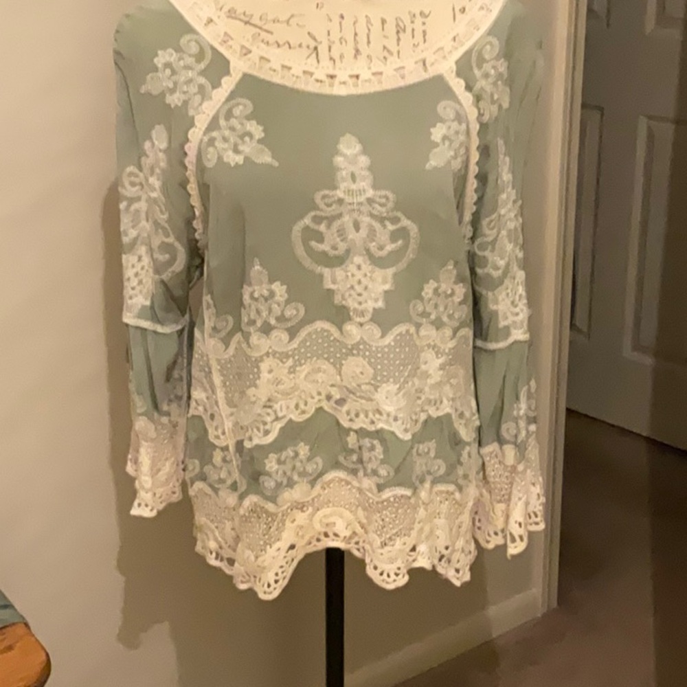 Top sage green w cream detail and lace. Size large